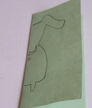 手工剪纸狗的步骤图解-可爱哈巴狗